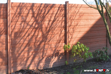 clôture en béton décoratif